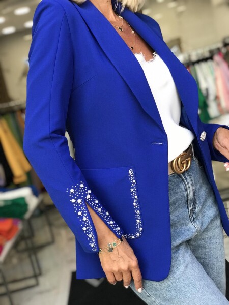 Елегантно сако с декоративен елемент  в синьо